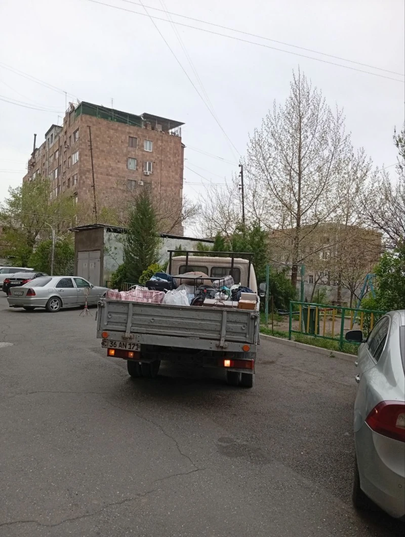 Moving with boxes between rented apartments in Yerevan
